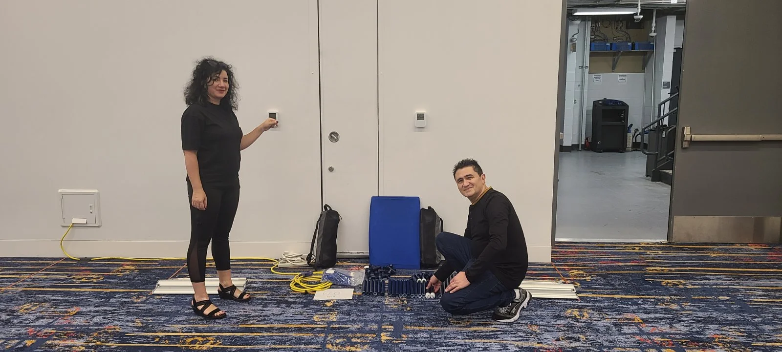 Team assembling the V5iD booth before the conference starts