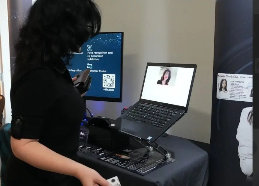 Kiosk Setup for Identity Verification Demo V5iD® CEO preparing identity verification kiosk for live demonstration