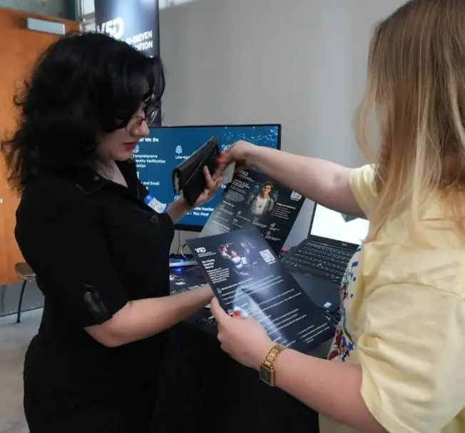 Sharing Identity Verification Insights V5iD® CEO sharing information about identity verification technology with attendee