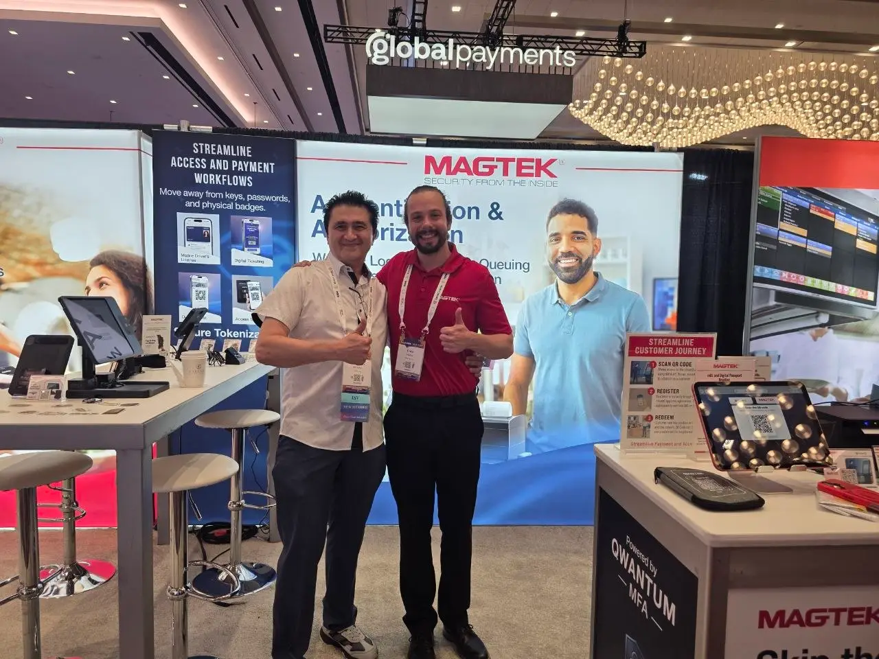 V5iD CTO visiting MagTek partner booth at RSPA RetailNOW 2026 V5iD CTO posing with a MagTek representative at the MagTek partner booth during RSPA RetailNOW 2026 at Caesars Forum, Las Vegas, both giving a thumbs-up.