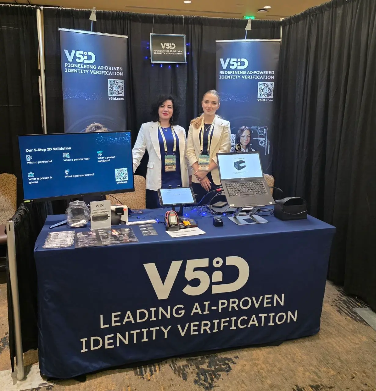 V5iD CEO and Summer Intern at 2026 Convention Booth V5iD CEO (in white blazer) and summer intern (in beige blazer) at the V5iD exhibition booth, 2026 Annual Convention.